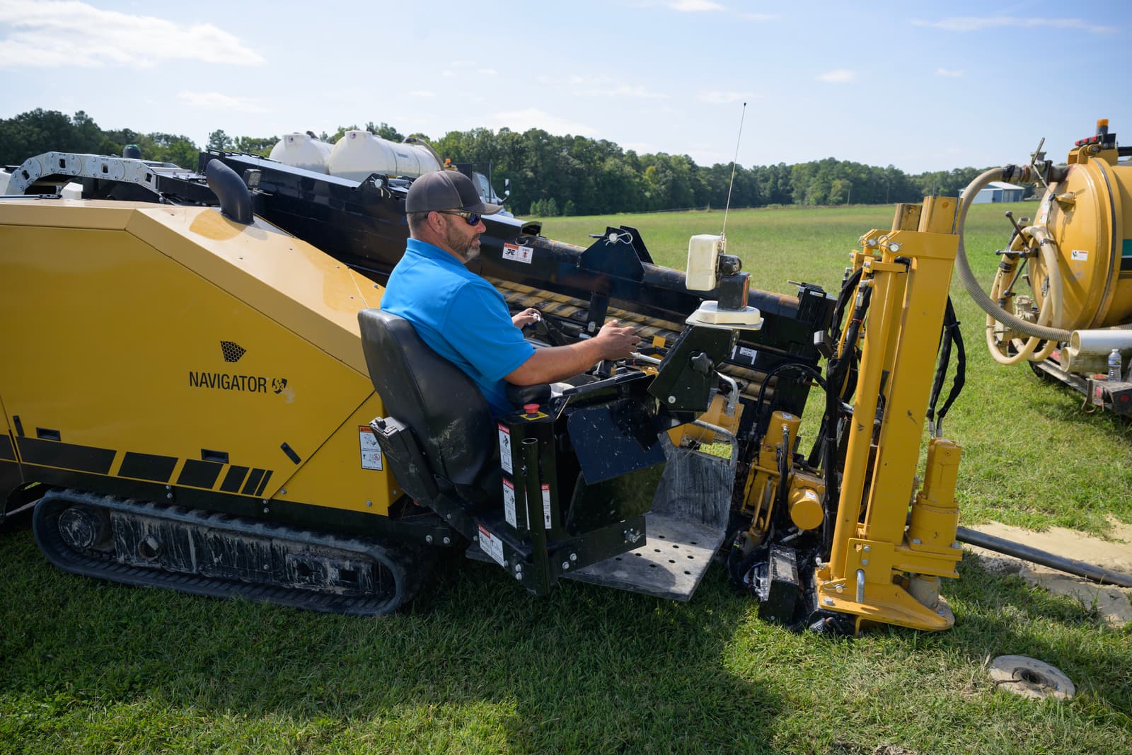 Fiber-optic crew operating a horizontal directional drilling rig